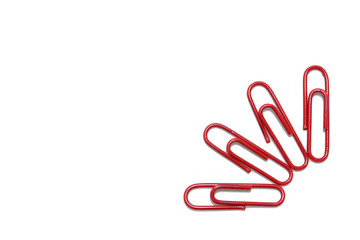 Red paper clip on isolated white