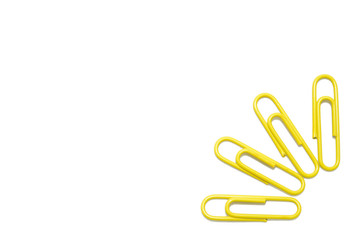 Obraz premium Yellow paper clip on isolated white