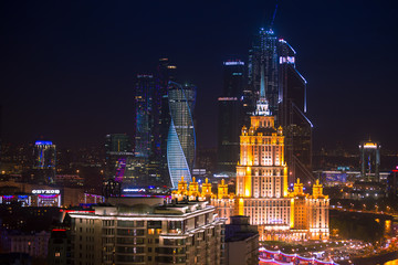 Moscow City and Stalin skyscraper night aerial panorama