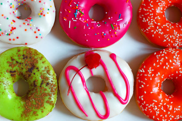 Donuts.Gift dessert. Confectionery background.
