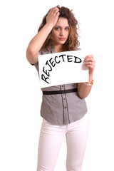 uncomfortable woman holding paper with Rejected text