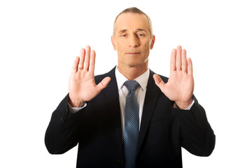 Businessman pressing abstract screen