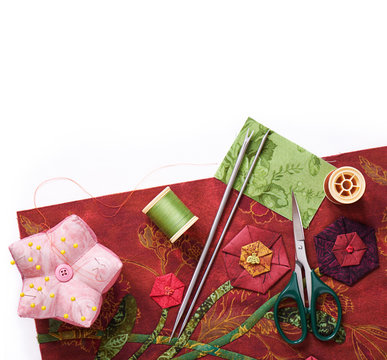 Tools for applique to fabric and detail of the quilt