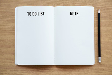 To do list on blank note book background