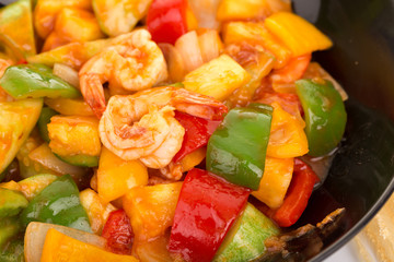 Sauted mixed vegetables and shrimp with tomato sauce