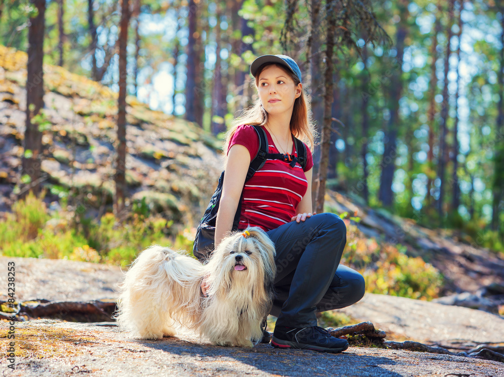 Sticker Young woman tourist with dog