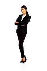 Businesswoman standing with folded arms