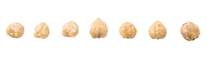 Candlenuts over white background