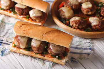 sandwiches with meatballs, cheese horizontal top view
