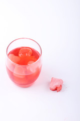 french card-suit-shaped ice from raspberry syrup