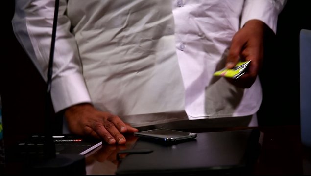 Male hands with cell phone