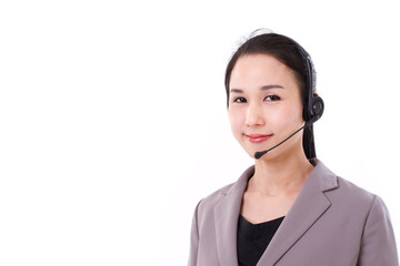 portrait of happy female customer service executive with headset