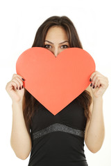 Beautiful woman with valentines day heart on white background