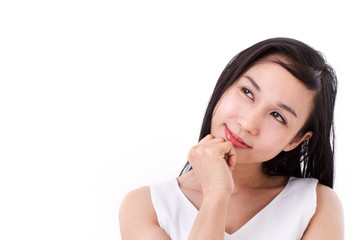 happy woman looking up at blank space