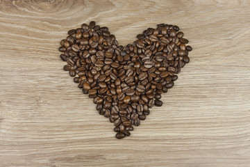 coffee beans in the shape of a human heart 