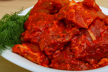 Raw marinated meat for bbq