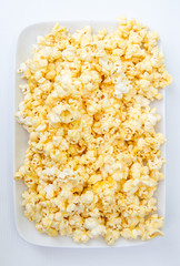 popcorn grains on the white background