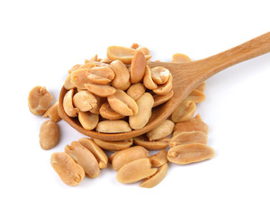  peanuts in spoon on white background