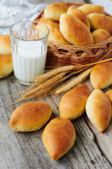 Fresh baked pasties on wooden table
