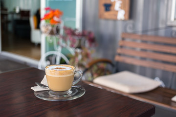 capucino coffee on wood background
