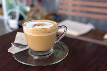 capucino coffee on wood background