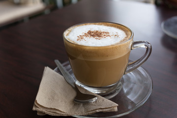 capucino coffee on wood background