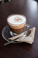 capucino coffee on wood background