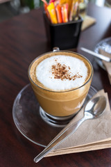 capucino coffee on wood background
