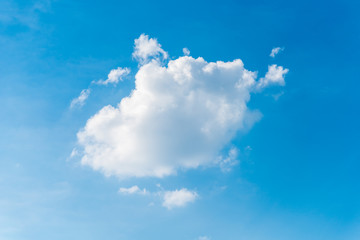 Single White Cloud On Blue Sky Background