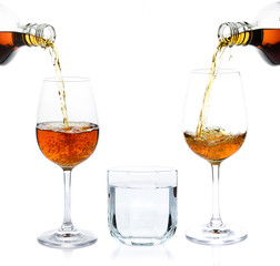 pour whisky into glass and drinking water