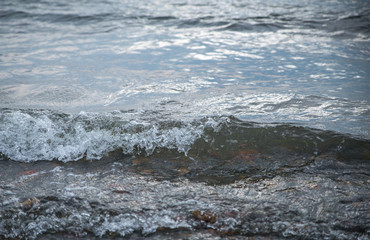 Waves at the seashore. Shallow depth of field.