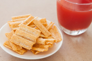 Snack on white plate with fruit punch