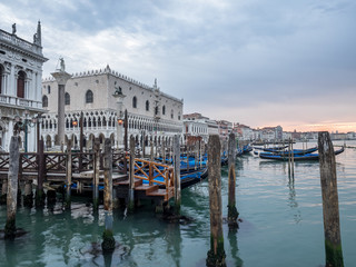 Venice, Italy - 20 May 2105: Gondolas moored on the lagoon. Earl