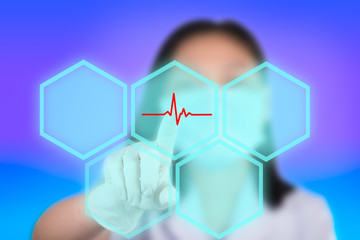 Nurse pressing cardio buttons show technology of medical