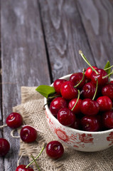 fresh cherries on wooden table