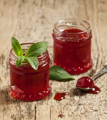Delicious homemade strawberry jam in a jar, selective focus