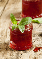 Delicious homemade strawberry jam in a jar, selective focus