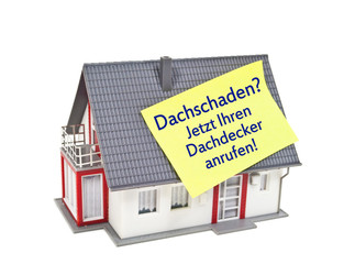 Haus mit Zettel und Dachschaden