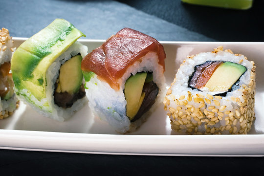 detail sushi rolls / closeup of platter with sushi rools menu