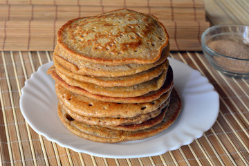 Stack of sweet pancakes with cinnamon sugar 