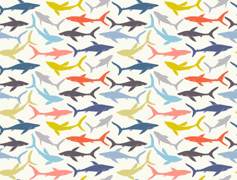 Seamless pattern of hand-drawn sharks silhouettes