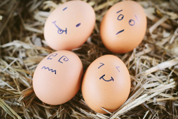 Painted  eggs about emotion on the face