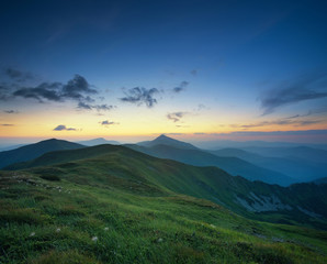 Mountain valley during sunrise. Natural summer landscape.