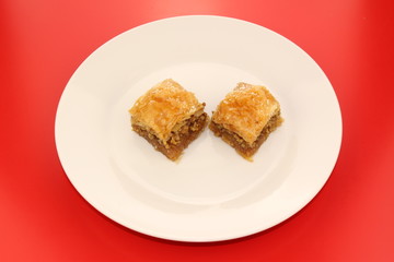 Traditional Turkish Ramadan dessert baklava on a white plate