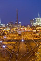 Fototapeta na wymiar Railroad Yard And Industry At Night