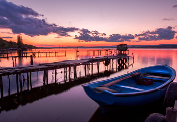 After sunset view with boats at a lake coast near Varna 