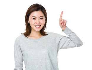 Woman with finger point upwards