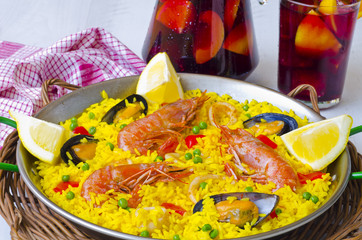 Spanish Cuisine. Paella and fresh sangria.