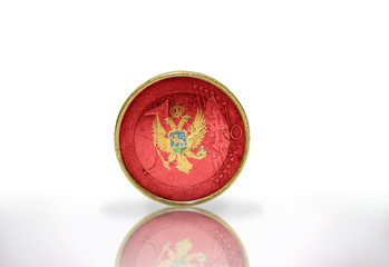 euro coin with montenegrin flag on the white background