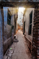 On the narrow street in the old city of Varanasi